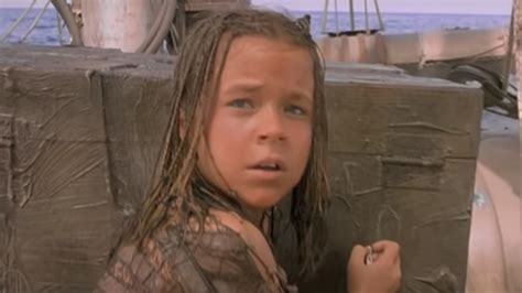 However, many fans may remember the film's youngest star most clearly, Tina Majorino, who played Enola, a little girl with a secret map to the mythical dry land tattooed on her back. . Enola from waterworld now